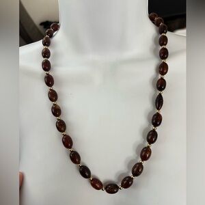 Vintage Brown Beaded Necklace with Gold Details